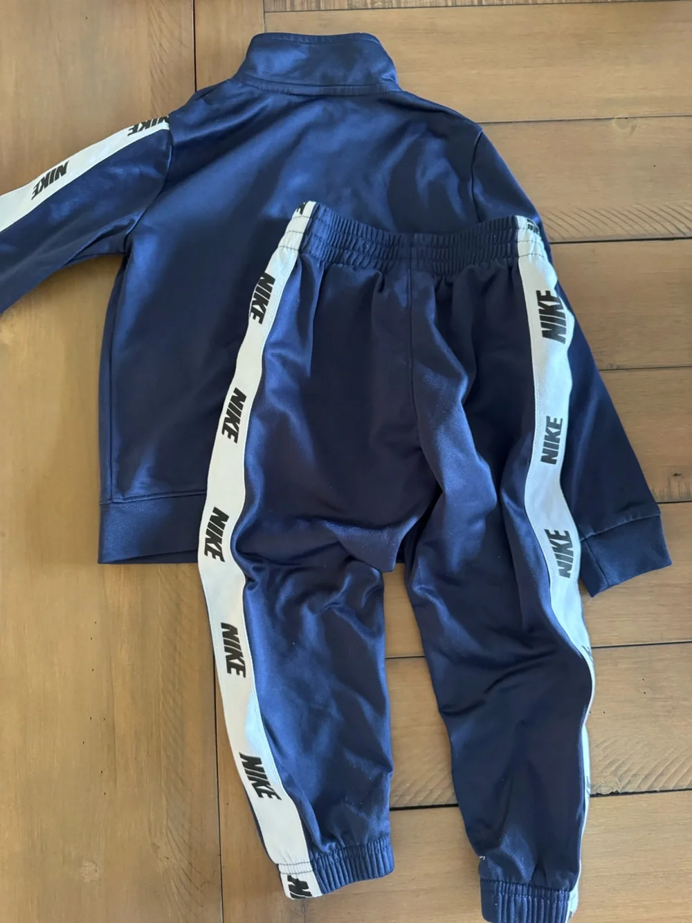 Nike Kids Navy Track Joggers with White Logo Tape